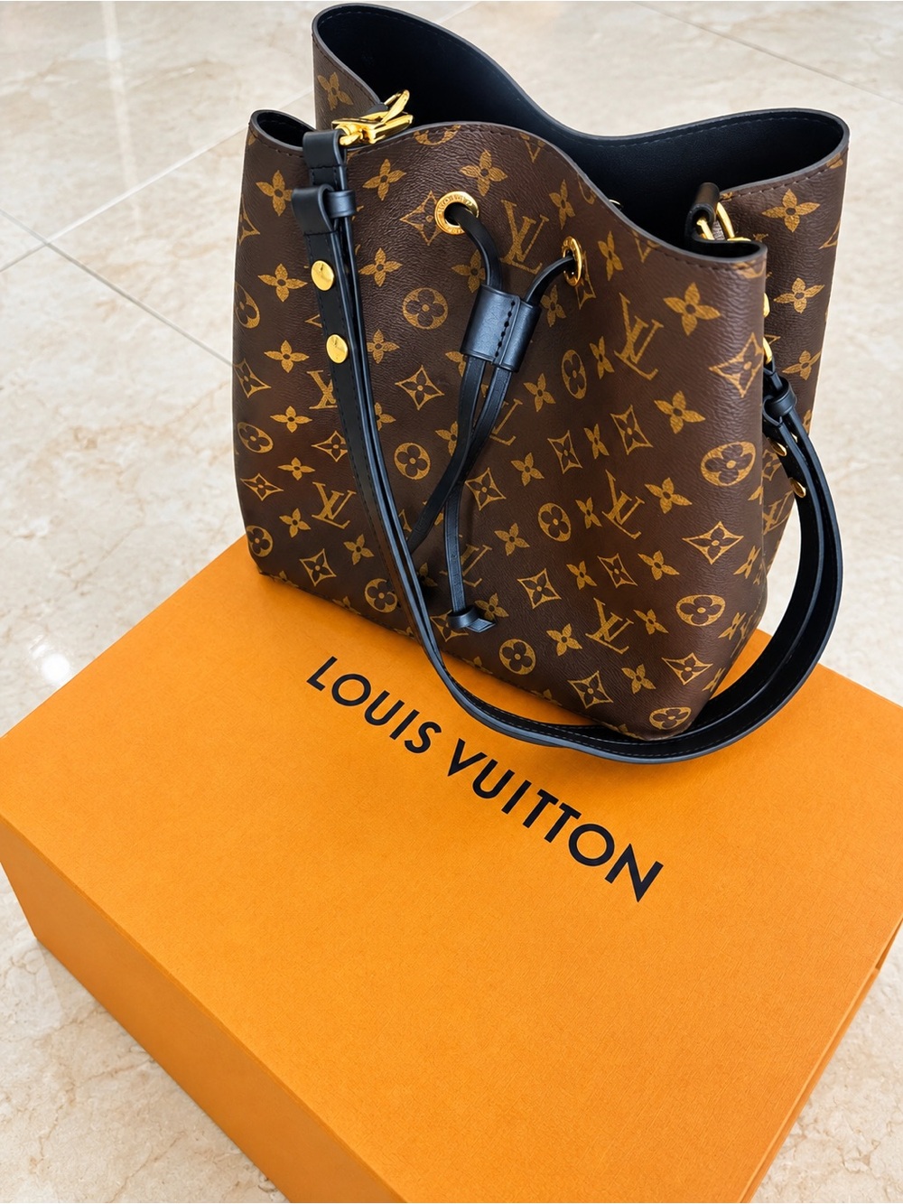 Louis Vuitton Brown Monogram Bucket Bag with Black Trim and Gold Hardware
